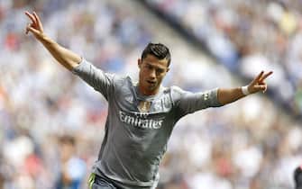 epaselect SPAIN SOCCER PRIMERA DIVISION epaselect epa04927046 Real Madrid's Portuguese player Cristiano Ronaldo celebrates his first goal during the Primera Division match against Espanyol held at the Power 8 Stadium in Cornella, Barcelona, Spain, 12 September 2015. EPA/ALEJANDRO GARCIA