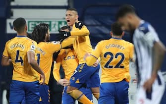 Everton's Richarlison (centre) celebrates scoring their side's first goal of the game during the Premier League match at The Hawthorns, West Bromwich. Picture date: Thursday March 4, 2021.