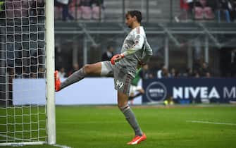 AC Milan's goalkeeper from Italy Gianluigi Donnarumma reacts after a goal during the Italian Serie A football match AC Milan vs Sassuolo on October 25, 2015 at the San Siro Stadium stadium in Milan. AFP PHOTO / OLIVIER MORIN        (Photo credit should read OLIVIER MORIN/AFP/Getty Images)