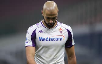 Sofyan Amrabat of ACF Fiorentina leaves the field of play with his head bowed after the final whistle of the Serie A match at Giuseppe Meazza, Milan. Picture date: 29th November 2020. Picture credit should read: Jonathan Moscrop/Sportimage via PA Images