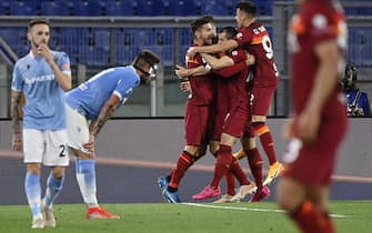 RomaÕs Henrikh Mkhitaryan (C) celebrates his goal with teammates during the Serie A soccer match between AS Roma and SS Lazio at the Olimpico stadium in Rome, Italy, 15 May 2021. ANSA/RICCARDO ANTIMIANI
