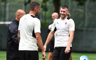 1330890731 CAIRATE, ITALY - JULY 27: Ante Rebic smiles during an AC Milan Training Session at Milanello on July 27, 2021 in Cairate, Italy. (Photo by Claudio Villa/AC Milan via Getty Images)