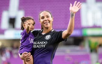 Orlando, Florida, July 4th 2021: Sydney Leroux (2 Orlando Pride) and her daughter, Roux, wave to the fans after the conclusion of the National Women's Soccer League game between Orlando Pride and North Carolina Courage at Exploria Stadium in Orlando, Florida. NO COMMERCIAL USAGE.  (Photo by Andrea Vilchez/SPP/Sipa USA)