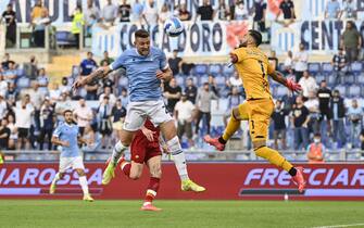 LazioÕs Sergej Milinkovic-Savic (L) scores a goal for Lazio during the Serie A soccer match between SS Lazio and AS and Roma at the Olimpico stadium in Rome, Italy, 26 September 2021. ANSA/RICCARDO ANTIMIANI