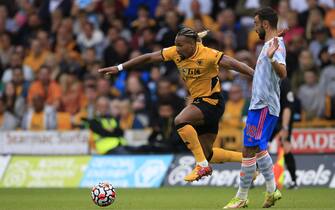 Adama Traore #37 of Wolverhampton Wanderers runs past Bruno Fernandez #18 of Manchester United in Wolverhampton, United Kingdom on 8/29/2021. (Photo by Conor Molloy/News Images/Sipa USA)