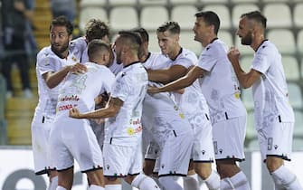 MODENA, ITALY - SEPTEMBER 06: Samuele Neglia of AC Reggiana celebrates after scoring his team's first goal with his teammates during the Serie C match between Modena FC and AC Reggiana at Alberto Braglia Stadium on September 06, 2021 in Modena, Italy. (Photo by Emmanuele Ciancaglini/Getty Images)