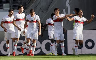 epa09463826 Stuttgart's Omar Marmoush (R) celebrates with teammates after scoring the 1-1 equalizer during the German Bundesliga soccer match between Eintracht Frankfurt and VfB Stuttgart in Frankfurt, Germany, 12 September 2021.  EPA/RONALD WITTEK CONDITIONS - ATTENTION: The DFL regulations prohibit any use of photographs as image sequences and/or quasi-video.