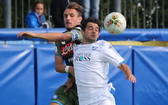 EMPOLI, ITALY - OCTOBER 07: Davide Merola of Empoli FC battles for the ball with Claudio Manzi of SSC Napoli during the Serie A Primavera match between Empoli U19 and Napoli U19 on October 7, 2019 in Empoli, Italy.  (Photo by Gabriele Maltinti/Getty Images)