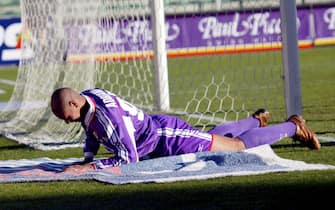 24 Feb 2002:  Adriano of Fiorentina shows his disappointment after missing a penalty with the last kick of the game during the Serie A match between Fiorentina and Lecce, played at the Artemio Franchi Stadium, Florence.  DIGITAL IMAGE Mandatory Credit: Grazia Neri/Getty Images