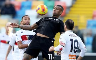 Udinese's Souza Silva Walace (C) contrasted by Genoa's Goran Pandev and Azevedo Junior Hernani (L) during the Italian Serie A soccer match Udinese Calcio vs Genoa CFC at the Friuli - Dacia Arena stadium in Udine, Italy, 28 November 2021. ANSA/GABRIELE MENIS