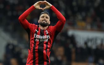 Olivier Giroud of AC Milan celebrates after scoring a goal during the Serie A 2021/22 football match between AC Milan and AS Roma at Giuseppe Meazza Stadium, Milan, Italy on January 06, 2022