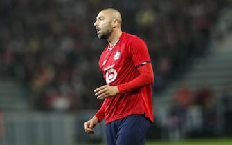 epa09534949 Lille’s Burak Yilmaz reacts during the UEFA Champions League group G soccer match between Lille OSC and Sevilla FC at the Stade Pierre Mauroy in Villeneuve-d'Ascq, Lille, France, 20 October 2021.  EPA/YOAN VALAT