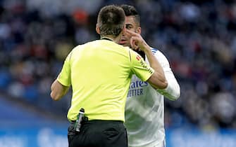 Carlos Henrique Casemiro of Real Madrid speaks with the referee Ricardo de Burgos Bengoetxea during the La Liga match between Real Madrid and Elche CF played at Santiago Bernabeu Stadium on January 23, 2021 in Madrid, Spain. (Photo by Alberto Molina / PRESSINPHOTO)