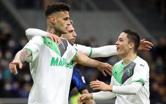 Sassuolo’s Gianluca Scamacca (L) jubilates with his teammate Sassuolo’s Giacomo Raspadori after scoring the 0-2 goal during the Italian serie A soccer match between FC Inter  and Sassuolo at Giuseppe Meazza stadium in Milan, 20 February  2022.  ANSA / MATTEO BAZZI