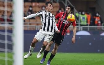 Paulo Dybala of Juventus FC fights for the ball against Sandro Tonali of AC Milan during the Serie A 2021/22 football match between AC Milan and Juventus FC at Giuseppe Meazza Stadium, Milan, Italy on January 23, 2022