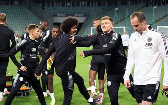 epa09496123 Leicester City players Hamza Choudhury (C-L) and Harvey Barnes (C-R) attend a training session at The Marshall Jozef Pilsudski's Municipal Stadium of Legia Warsaw in Warsaw, Poland, 29 September 2021. Legia Warsaw will face Leicester City in their UEFA Europa League soccer match on 30 September 2021.  EPA/Leszek Szymanski POLAND OUT
