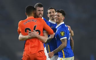 Brighton and Hove Albion goalkeeper Robert Sanchez, Adam Webster, Lewis Dunk and Ben White celebrate after the final whistle during the Premier League match at the AMEX Stadium, Brighton. Picture date: Sunday January 31, 2021.