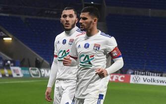 Lyon's French forward Rayan Cherki (L) and Houssem AOUAR   during the French Cup round-of-32 football match between Lyon (OL) and Sochaux (FCSM) at The Groupama Stadium in Decines-Charpieu, near Lyon, central-eastern France on March 6, 2021.

//ALLILIMOURAD_allili917/2103071043/Credit:Mourad ALLILI/SIPA/2103071044