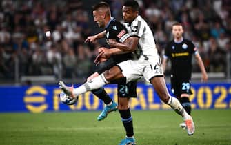 Lazios midfielder Sergej Milinkovic-Savic from Serbia (L) vies for the ball with Juventus defender Alex Sandro from Brazil (R) during the Serie A football match Juventus vs Lazio at the Allianz Stadium in Turin, on May 16, 2022. (Photo by MARCO BERTORELLO / AFP) (Photo by MARCO BERTORELLO/AFP via Getty Images)