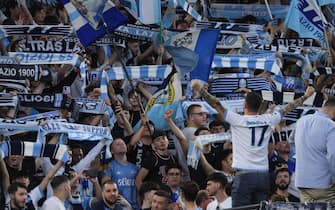 ROME, ITALY - MAY 21: SS Lazio supporters show a flag before  the Serie A match between SS Lazio and Hellas Verona FC at Stadio Olimpico on May 21, 2022 in Rome, Italy. (Photo by Silvia Lore/Getty Images)