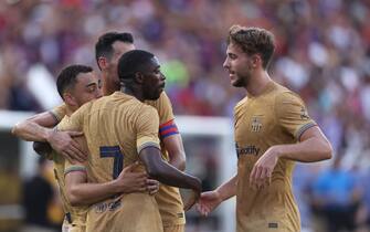 DALLAS, TX - JULY 26: Ousmane DembÃ©lÃ© #7 of Barcelona celebrates with his teammates after scores 2nd goal during the preseason friendly match between FC Barcelona and Juventus FC at Cotton Bowl on July 26, 2022 in Dallas, Texas. (Photo by Omar Vega/Getty Images)