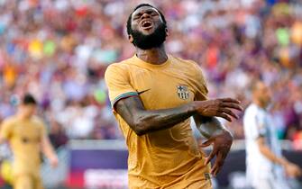 DALLAS, TEXAS - JULY 26: Franck Kessie #19 of FC Barcelona reacts after a missed shot on goal against Juventus in the first half of a 2022 International Friendly match at the Cotton Bowl on July 26, 2022 in Dallas, Texas. (Photo by Ron Jenkins/Getty Images)