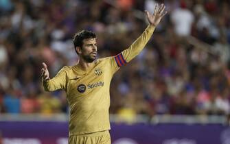 DALLAS, TX - JULY 26: Gerard Pique #3 of Barcelona gestures during the preseason friendly match between FC Barcelona and Juventus FC at Cotton Bowl on July 26, 2022 in Dallas, Texas. (Photo by Omar Vega/Getty Images)