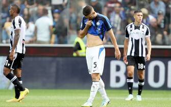 Inter’s Roberto Gagliardini shows his dejection at the end of the Italian Serie A soccer match Udinese Calcio vs FC Internazionale at the Friuli - Dacia Arena stadium in Udine, Italy, 18 September 2022. ANSA / GABRIELE MENIS