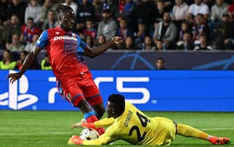 Pilsen, Czech Republic. 13th Sep, 2022. From left soccer players Fortune Bassey of Viktoria Plzen and goalie of Inter Milan Andre Onana in action during the Viktoria Plzen vs Inter Milan, 2nd round of group C of football Champions' League match in Pilsen, Czech Republic, September 13, 2022. Credit: Michal Kamaryt/CTK Photo/Alamy Live News