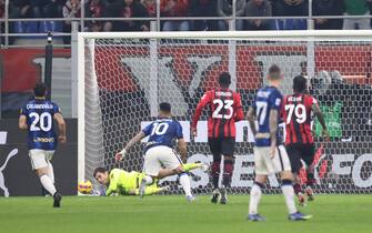 Milan, Italy, 7th November 2021. Ciprian Tatarusanu of AC Milan saves a first half penalty from Lautaro Martinez of FC Internazionale during the Serie A match at Giuseppe Meazza, Milan. Picture credit should read: Jonathan Moscrop / Sportimage via PA Images