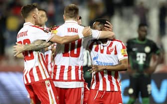 epa10227278 Guelor Kanga (2-R) of Red Star celebrates with teammates after scoring the 1-0 lead from penalty spot during the UEFA Europa League group H soccer match between Red Star Belgrade and Ferencvaros Budapest in Belgrade, Serbia, 06 October 2022.  EPA/ANDREJ CUKIC
