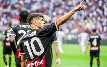 AC Milan's Brahim Diaz jubilates with his teammates after scoring the goal during the Italian serie A soccer match between Ac Milan and Udinese at Giuseppe Meazza stadium in Milan, 13  August 2022.ANSA / MATTEO BAZZI
