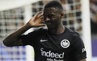 epa10267738 Randal Kolo Muani of Frankfurt celebrates after scoring his team's second goal during the UEFA Champions League group D soccer match between Eintracht Frankfurt and Olympique Marseille in Frankfurt am Main, Germany, 26 October 2022.  EPA/RONALD WITTEK
