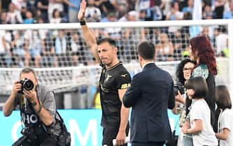 Lazio’s soccer players celebrate Stefan Radu last match at Olimpico Stadium in Rome, 29 May 2023. ANSA/CLAUDIO PERI