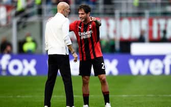 MILAN, ITALY - May 01, 2022: Davide Calabria of AC Milan speaks with Stefano Pioli, head coach of AC Milan, during the Serie A football match between AC Milan and ACF Fiorentina. (Photo by Nicolò Campo/Sipa USA)