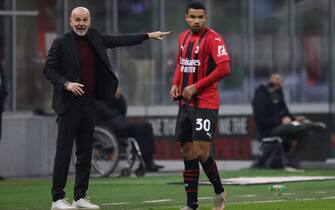 Milan, Italy, 13th January 2022. Stefano Pioli Head coach of AC Milan reacts as Junior Messias of AC Milan looks on during the Coppa Italia match at Giuseppe Meazza, Milan. Picture credit should read: Jonathan Moscrop / Sportimage via PA Images