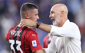 Genoa, Italy, 23rd August 2021. Stefano Pioli Head coach of AC Milan embraces Race Krunic of AC Milan following the final whistle of the Serie A match at Luigi Ferraris, Genoa. Picture credit should read: Jonathan Moscrop / Sportimage via PA Images