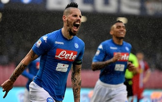 Napoli's Slovakian midfielder Marek Hamsik celebrates after scoring a goal before it is disallowed due to offside during the Serie A football match between Napoli and Spal at San Paolo Stadium Stadium in Naples on February 18, 2018.  / AFP PHOTO / TIZIANA FABI        (Photo credit should read TIZIANA FABI/AFP via Getty Images)