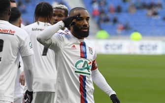 Lyon s forward Alexandre Lacazette celebrate scoring  during the French Cup round of 32 football match between Chambery Savoie Football and Olympique Lyonnais (OL) at the Groupama Stadium in Decines-Charpieu on January 21, 2023.