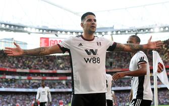 epa10142295 Fulham's Aleksandar Mitrovic celebrates after scoring during the English Premier League soccer match between Arsenal and Fulham at the Emirates Stadium in London, Britain, 27 August 2022.  EPA/ANDY RAIN EDITORIAL USE ONLY. No use with unauthorized audio, video, data, fixture lists, club/league logos or 'live' services. Online in-match use limited to 120 images, no video emulation. No use in betting, games or single club/league/player publications