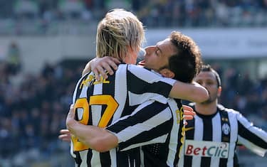 TURIN, ITALY - MARCH 20:  Milos Krasic (L) of Juventus FC celebrates with team mate Alessandro Del Piero after scoring the opening goal  during the Serie A match between Juventus FC and Brescia Calcio at Olimpico Stadium on March 20, 2011 in Turin, Italy.  (Photo by Valerio Pennicino/Getty Images)