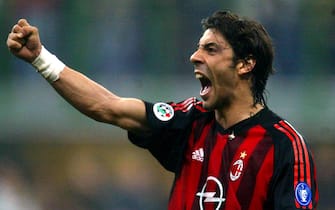 MILAN - APRIL 11:  Manuel Rui Costa of AC Milan celebrates as his team score during the Serie A match between Inter Milan and AC Milan, played at the 'Giuseppe Meazza' San Siro Stadium, Milan, Italy on April 11, 2003.  (Photo by Grazia Neri/Getty Images)