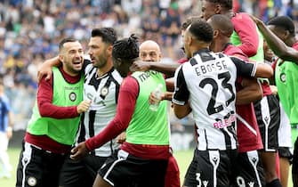 Udinese's Tolgay Arslan (L) jubilates with his teammates after scoring the goal during the Italian Serie A soccer match Udinese Calcio vs FC Internazionale at the Friuli - Dacia Arena stadium in Udine, Italy, 18 September 2022. ANSA / GABRIELE MENIS