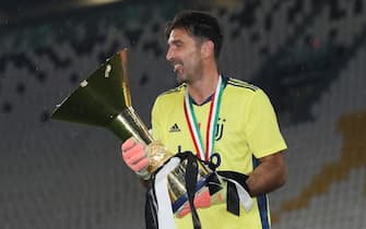 Gianluigi Buffon of Juventus celebrates with the Scudetto following the Serie A match at Allianz Stadium, Turin. Picture date: 1st August 2020. Picture credit should read: Jonathan Moscrop/Sportimage via PA Images