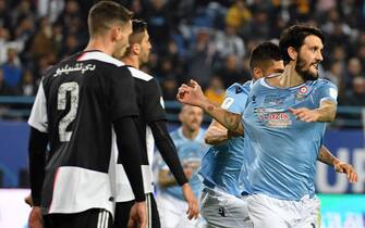 1190082234 RIYADH, SAUDI ARABIA - DECEMBER 22: Luis Alberto Romero Alconchel of SS Lazio celebrates after scoring the opening goal with teammate Carlos Joaquin Correa during the Italian Supercup match between Juventus and SS Lazio at King Saud University Stadium on December 22, 2019 in Riyadh, Saudi Arabia. (Photo by Marco Rosi/Getty Images)