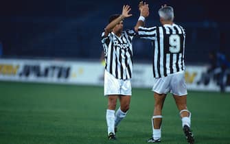 TURIN, ITALY: Juventus player Roberto Baggio celebrates a goal  with Ravanelli during  a match on 1992 , in Turin, Italy. (Photo by Juventus FC - Archive/Juventus FC via Getty Images)