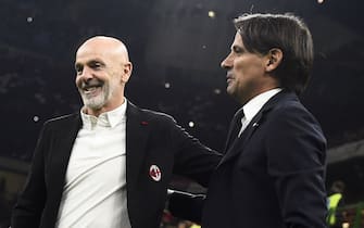 MILAN, ITALY - November 07, 2021: Simone Inzaghi (R), head coach of FC Internazionale, shakes hands with Stefano Pioli, head coach of AC Milan, during the Serie A football match between AC Milan and FC Internazionale. (Photo by Nicolò Campo/Sipa USA)