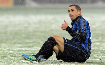 68242687 MILAN, ITALY - FEBRUARY 01: Angelo Palombo of FC Inter Milan gestures during the Serie A match between FC Internazionale Milano and US Citta di Palermo at Stadio Giuseppe Meazza on February 1, 2012 in Milan, Italy. (Photo by Claudio Villa/Getty Images)