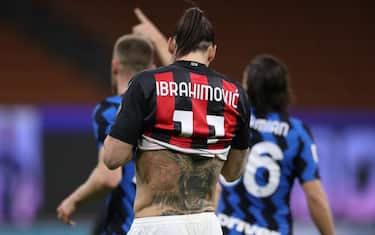 Zlatan Ibrahimovic of AC Milan wipes his face on his shirt  revealing a tattoo of a lion's head on his back during the Coppa Italia match at Giuseppe Meazza, Milan. Picture date: 26th January 2021. Picture credit should read: Jonathan Moscrop/Sportimage via PA Images
