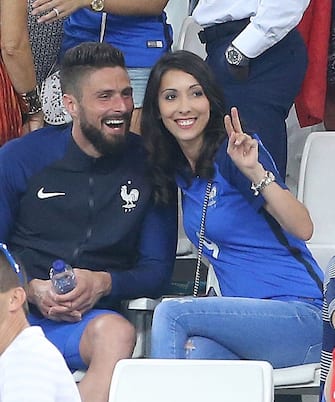 MARSEILLE, FRANCE - JULY 7: Olivier Giroud of France and his wife Jennifer Giroud celebrate the victory following the UEFA Euro 2016 semi-final match between Germany and France at Stade Velodrome on July 7, 2016 in Marseille, France. (Photo by Jean Catuffe/Getty Images)